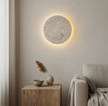 Luna travertine sconce