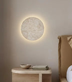 Luna travertine sconce