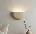 Luna arc travertine sconce